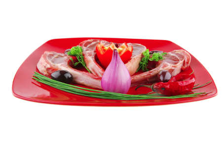 image of uncooked ribs served on redの写真素材