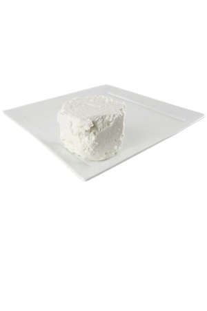 light soft cheese on plate over whiteの写真素材
