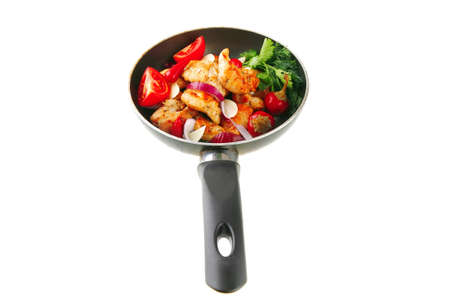 chicken briskaet fried on pan with vegetablesの写真素材