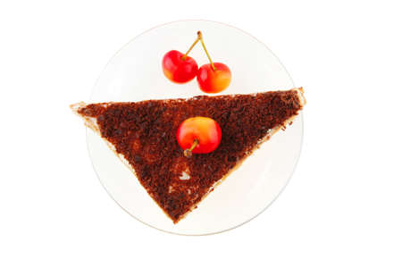 cheesecake with cherry on transparent saucer on whiteの写真素材