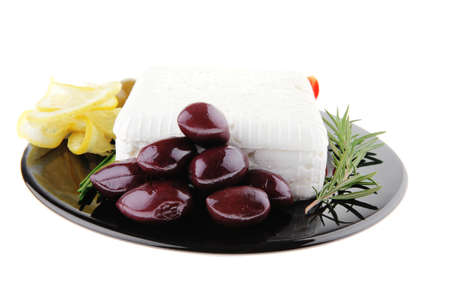 image of feta cheese and olives on blackの写真素材