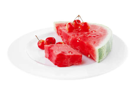 image of watermelon slices and cherrys on whiteの写真素材