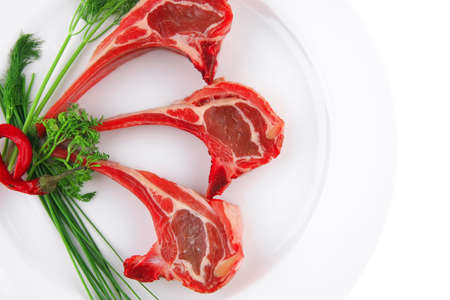 image of fresh raw ribs and greeneryの写真素材