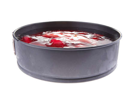 sweet cold red jelly cake with fruits insideの写真素材