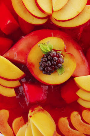 cold red jelly pie with peach and nectarineの写真素材