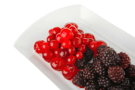 sweet clear cherry and wild berry on plateの写真素材
