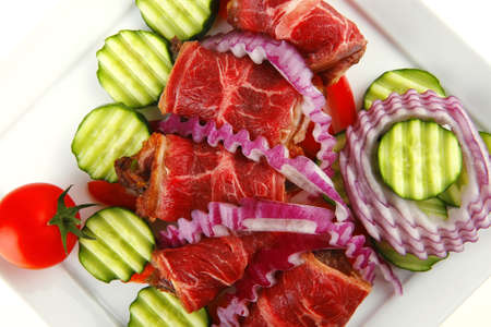 fresh served roasted meat rolls on white platterの写真素材