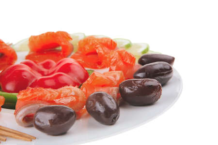 olives lemon and smoked salmon with cucumbersの写真素材