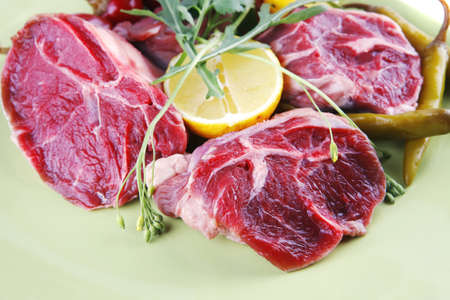 raw beef meat medallion prepared on plate
