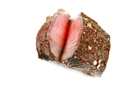 whole roast beef slice isolated over white の写真素材