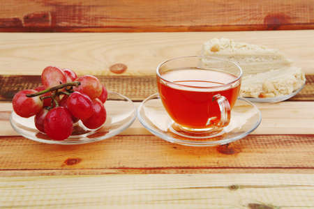 cake dessert and tea on wooden tableの写真素材