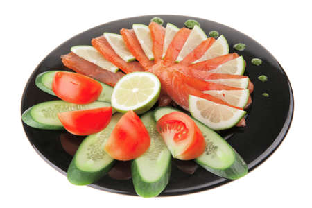 fresh smoked salmon served on black plateの写真素材