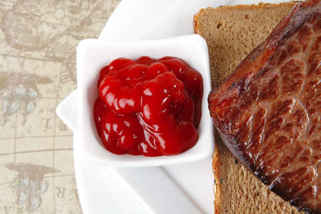 beef and spices with vegetables on whiteの写真素材