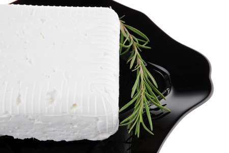 white soft cheese and rosemary on blackの写真素材
