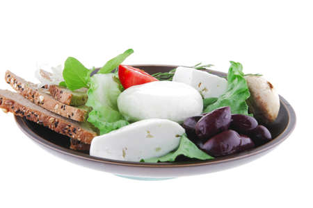 soft mozzarella served with bread on dark plateの写真素材