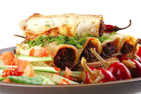 traditional italian cannelloni with fresh tomato cherry peppersの写真素材