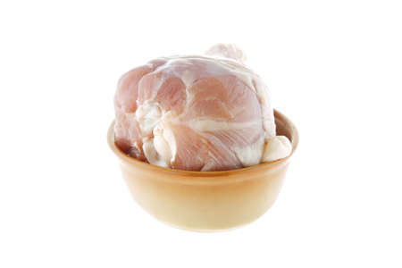 single chicken drumstick on bowl over white backgroundの写真素材