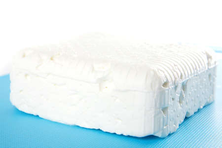 light white cheese on dishware over white