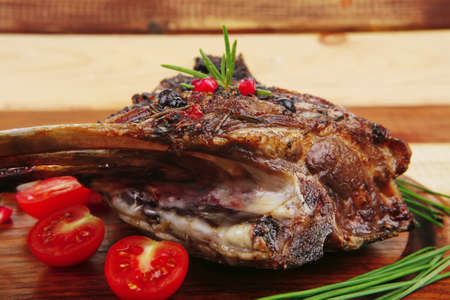 ribs rack on wood with stainless steel cutleryの写真素材