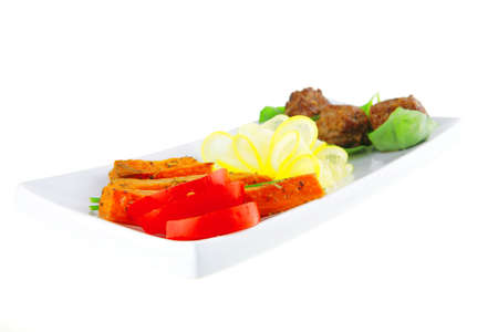 beef meatballs and basil with tomatoes and potatoesの写真素材