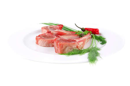 image of fresh raw ribs and greeneryの写真素材
