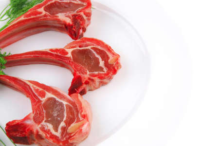 image of red veal ribs with greenery and pepperの写真素材