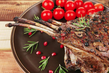 grilled meat ribs ready to eat with vegetablesの写真素材