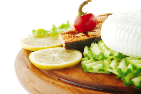 roast salmon fillet with cheese and tomatoesの写真素材