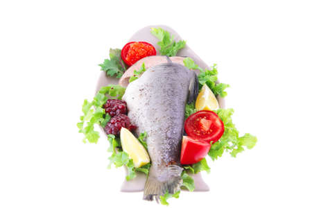 served salmon with caviar on plate over whiteの写真素材