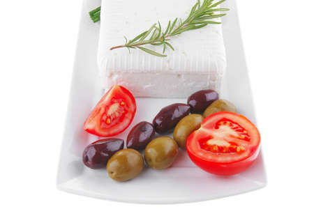 soft white cheese with bright toast and olivesの写真素材