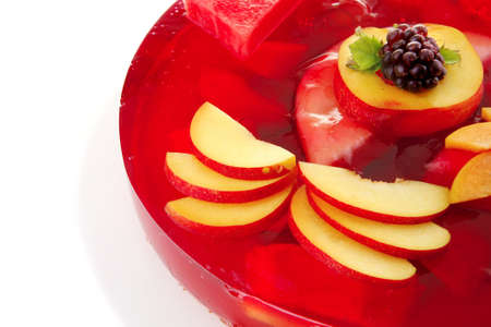 sweet cold red jelly cake with peach の写真素材