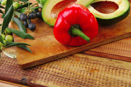 raw vegetables with oil prepared for saladの写真素材