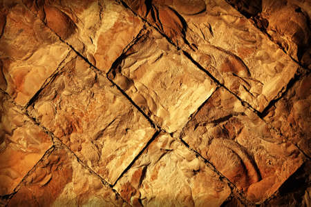 vintage image of old style aged cracked stone wallの写真素材