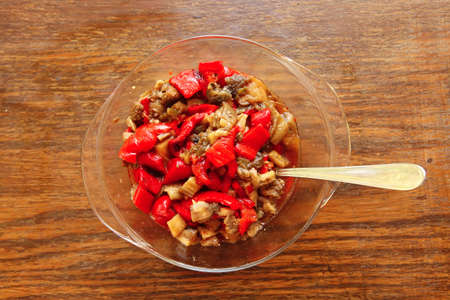 homemade food: salads and grilled chicked served over wooden tablesの写真素材