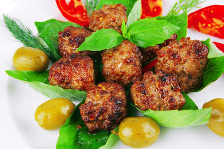meatballs and vegetables with basil and vegetablesの写真素材