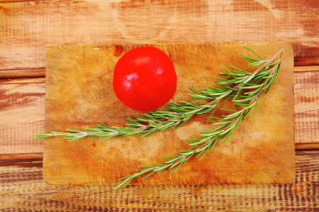 raw vegetables served on wood cutting boardの写真素材