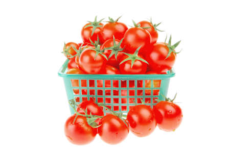 raw tomato cherry in basketの写真素材