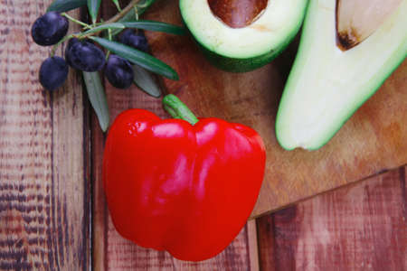 raw vegetables with oil prepared for saladの写真素材