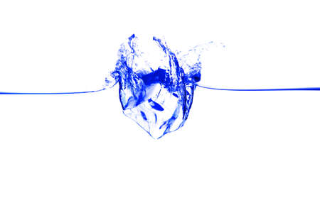 small blue real water splash isolated on white background の写真素材