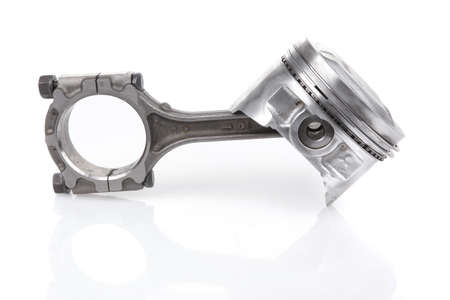 real used alluminium piston isolated over white backgroundの写真素材
