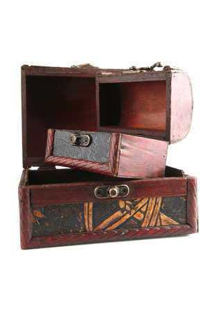 two open wooden chests with metal ornament