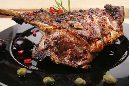 baby ribs served on plate over wooden tableの写真素材
