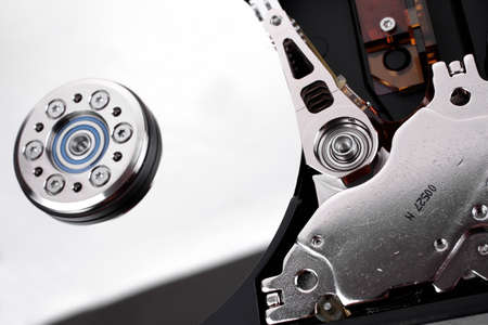 real open hard drive isolated on white ackground