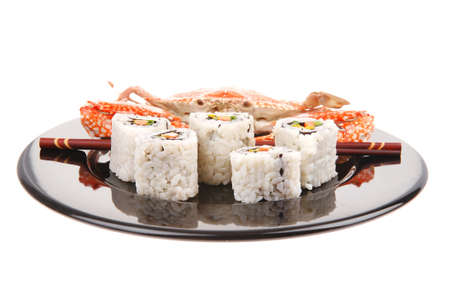 California Roll with Avocado and Salmon, Cream Cheese . on black dish with boiled crab . Japanese Traditional Cuisineの写真素材