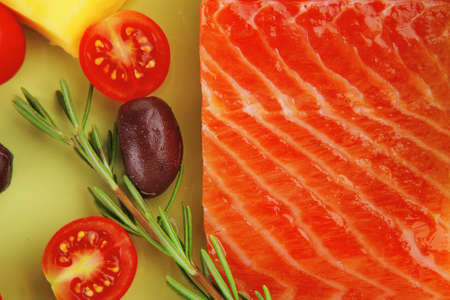 smoked salmon bar on plate with vegetables