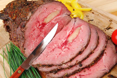 beef barbecue served on big wooden plateのeditorial素材