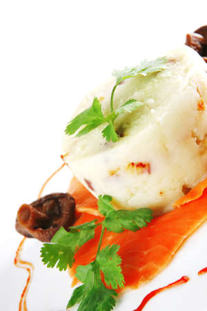 smoked salmon served with mashed potatoes on whiteのeditorial素材