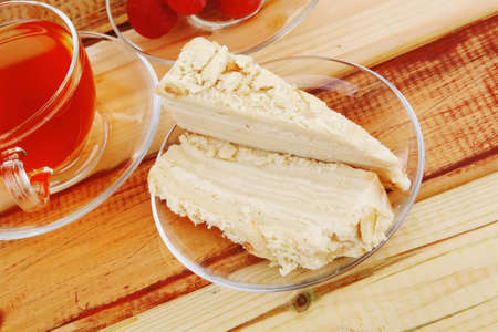 cake dessert and tea on wooden table