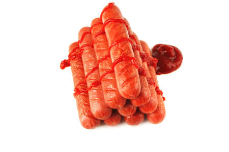 served grilled beef red sausages pyramide over whiteの写真素材