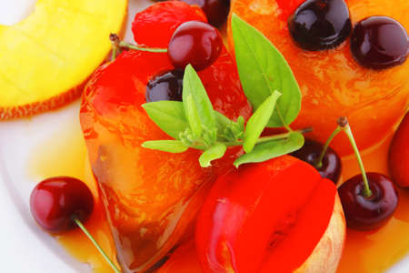 fruit ice cream with raw fruits on white